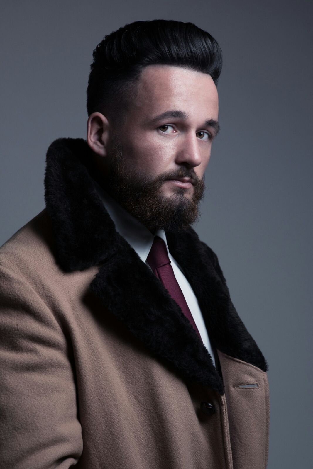 Editorial pompadour and full beard